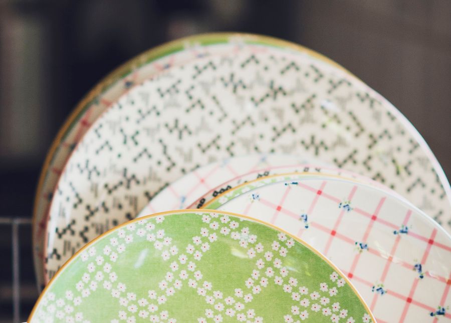 Caring for someone with changing behaviours- photo of patterned dinner plates in a drying rack
