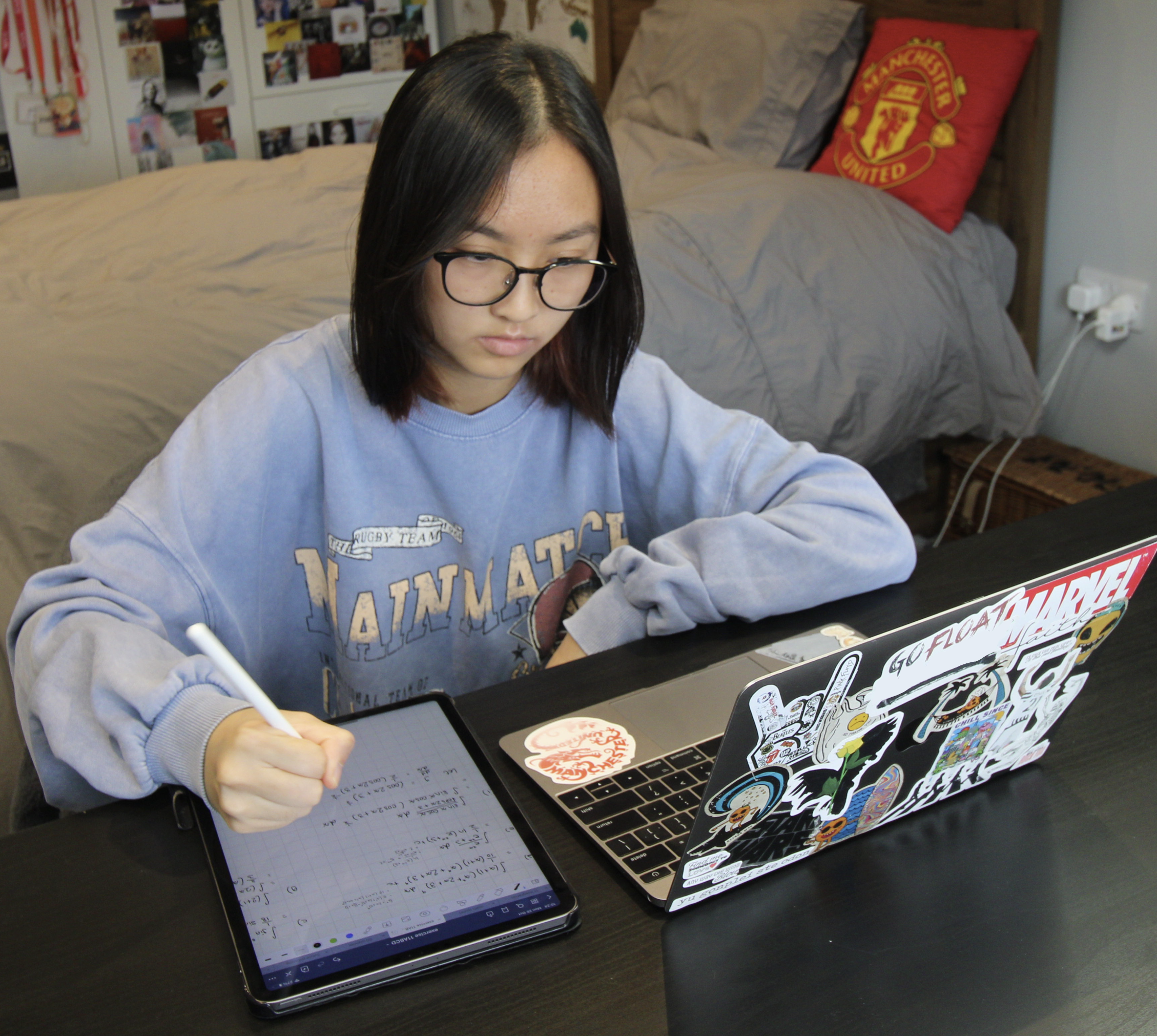 CGA student at laptop