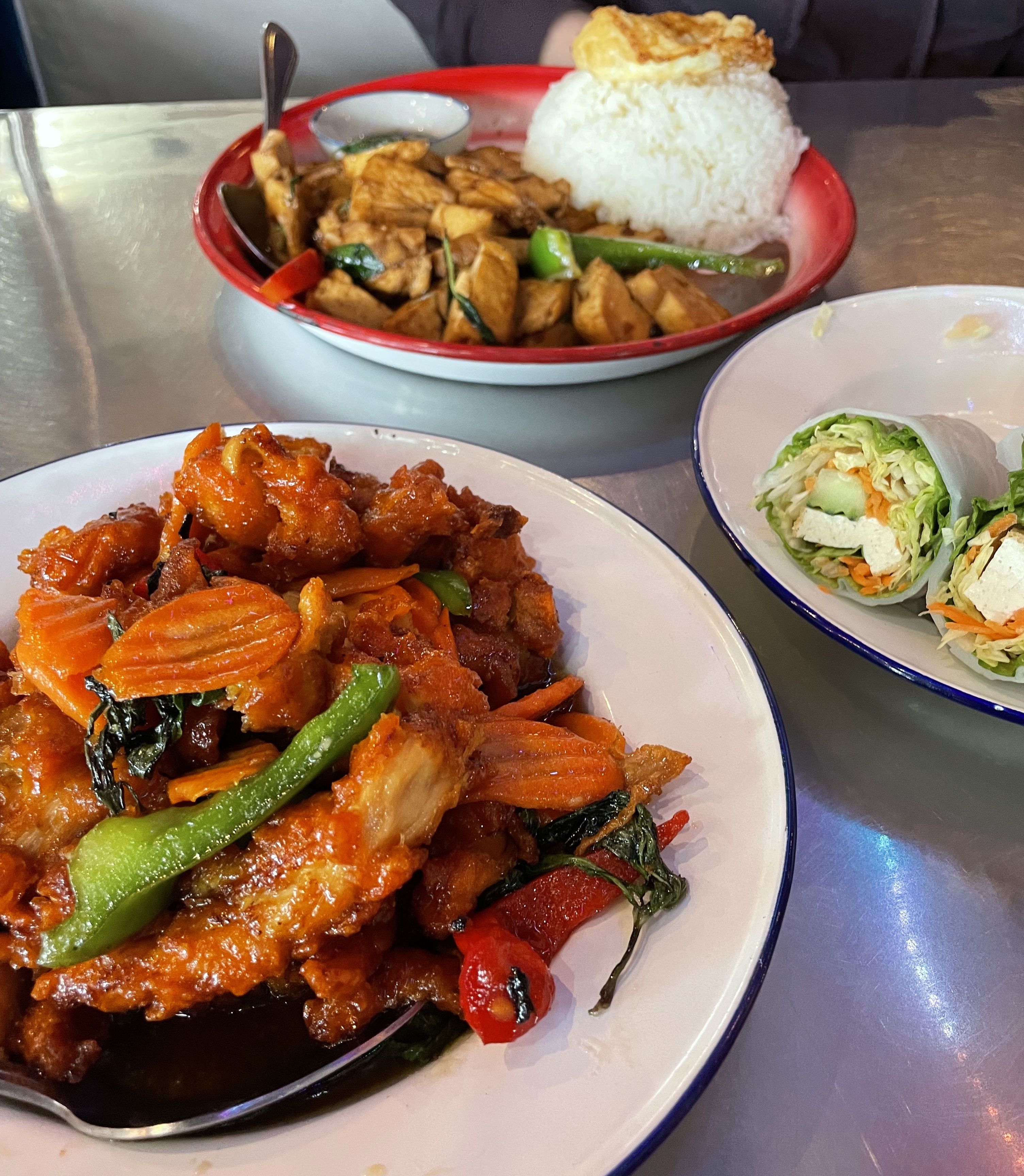 Spicy Crispy Chicken Basil (bottom left) from Khao San Thai Street Food (Photo by @flavormoth)
