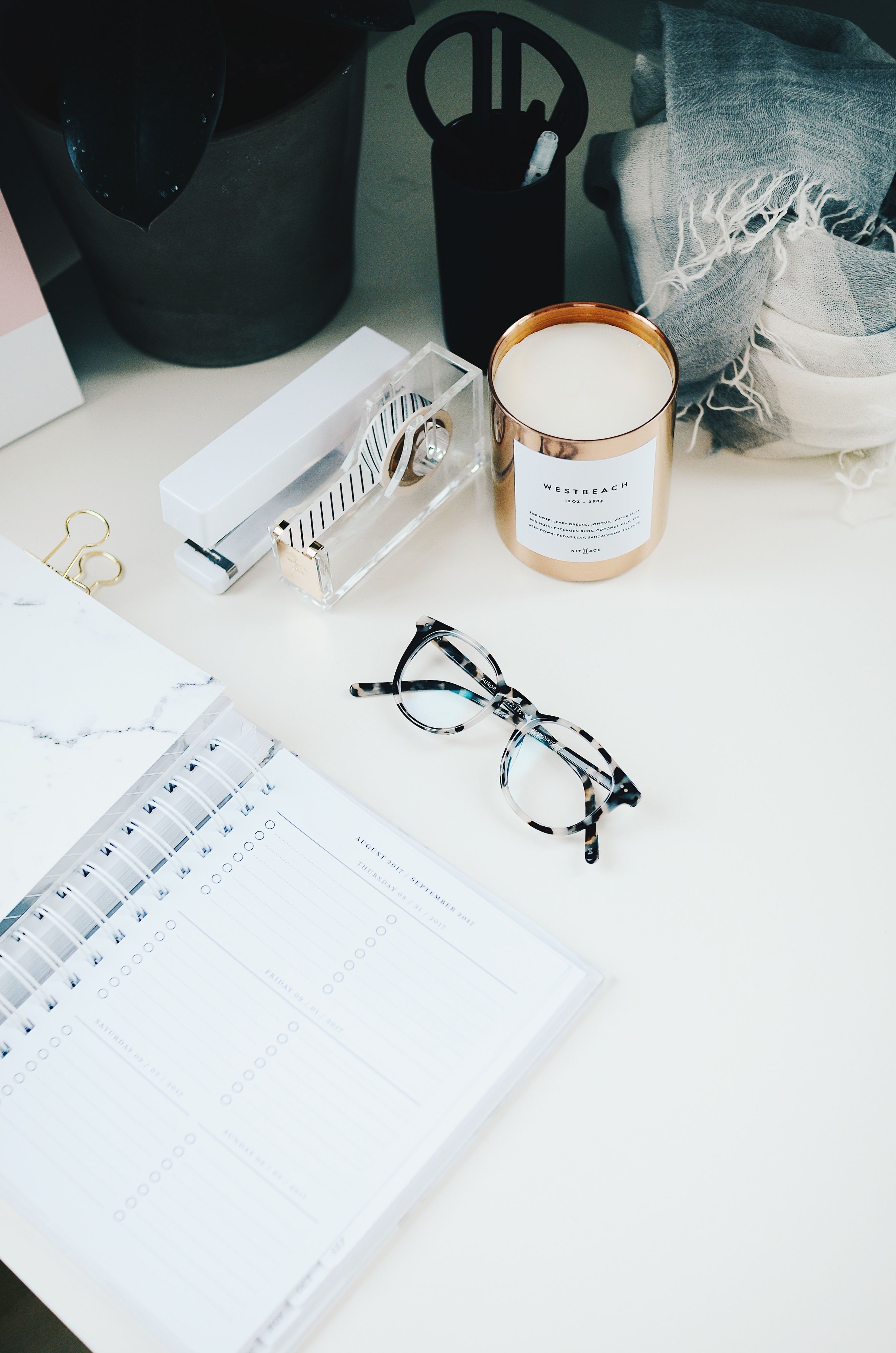 Glasses and task list on desk workspace for office manager executive assistant