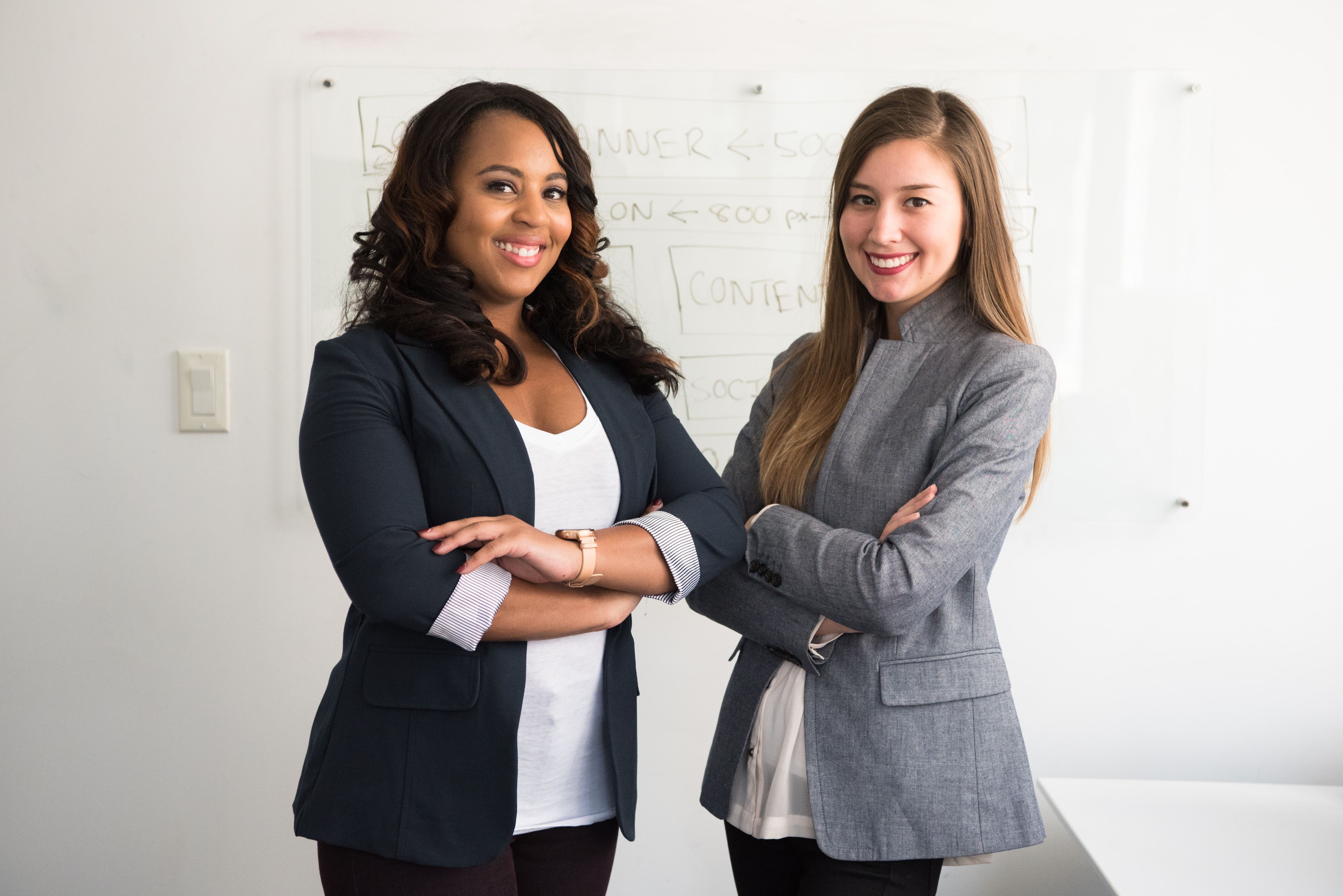 Two women office managers in an office