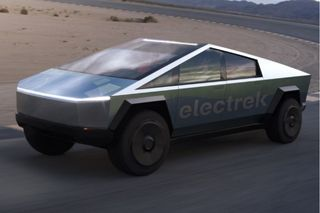 Auto znacky Tesla jedouci na ceste