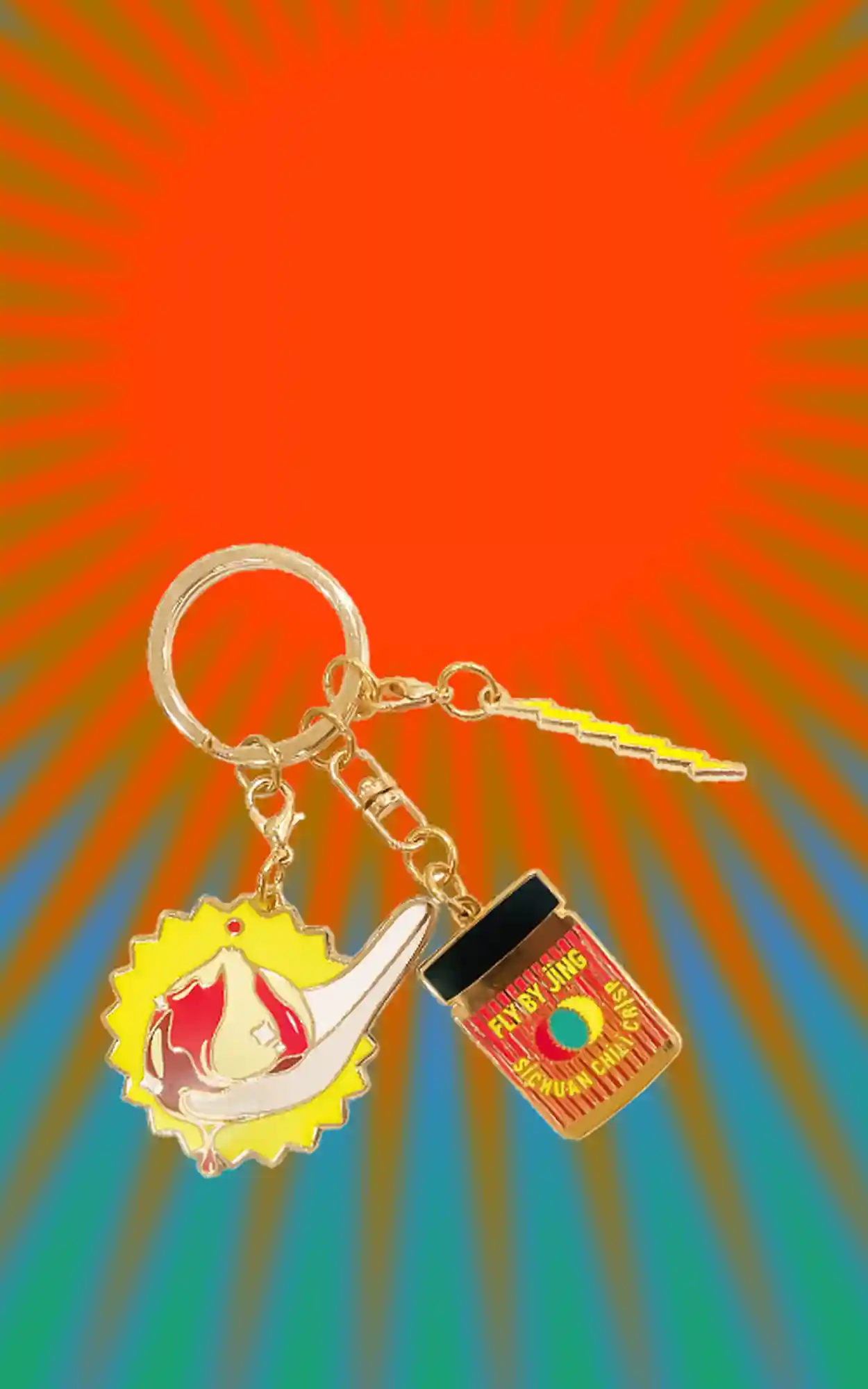 Fly By Jing x Pintrill Chili Crisp keychain with tie dye effect in the background