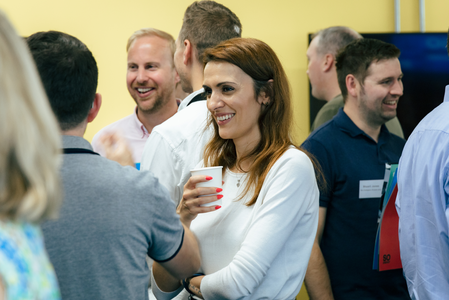 Group of people socialising at a collaboration event