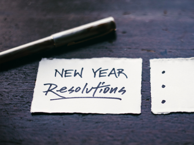 New years resolutions written on paper