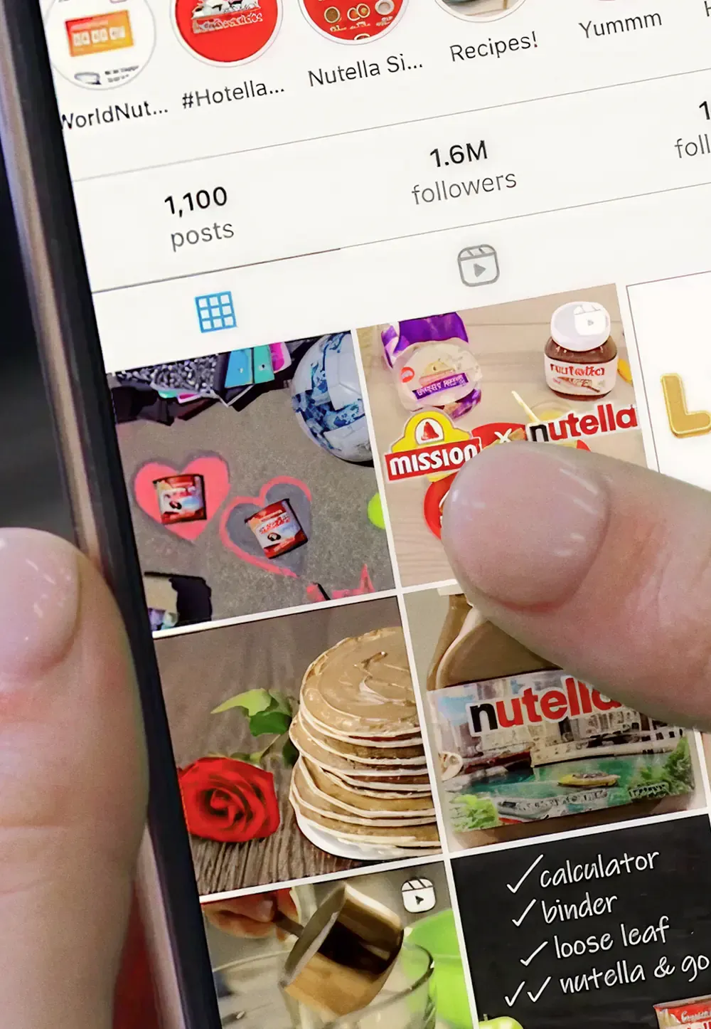 Hand holding a phone showing a social media feed, from the Sound of Nutella campaign