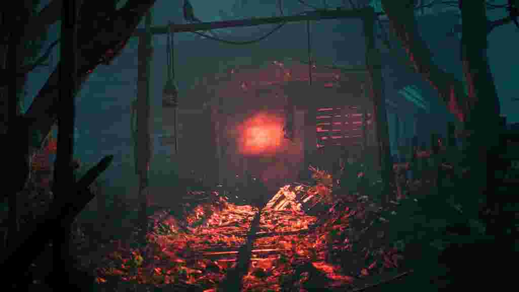 A wooden shack in the forest containing a red glowing light