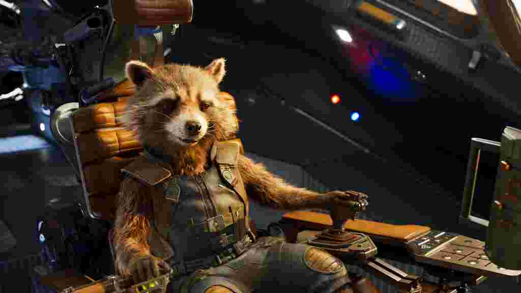 Animated racoon character sat in a spaceship cockpit