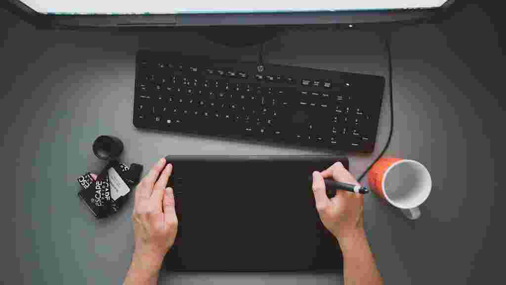 A female student using a Wacom tablet