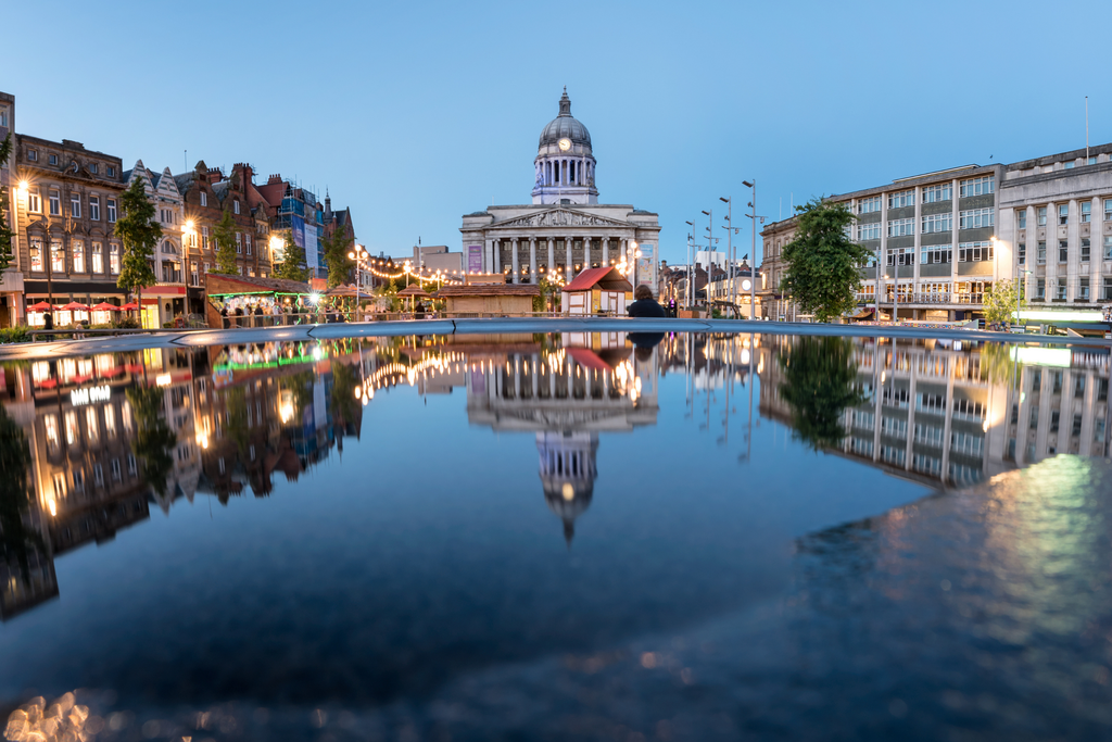 Nottingham city hall in the Old Market Square with a pool and fountain in the foreground