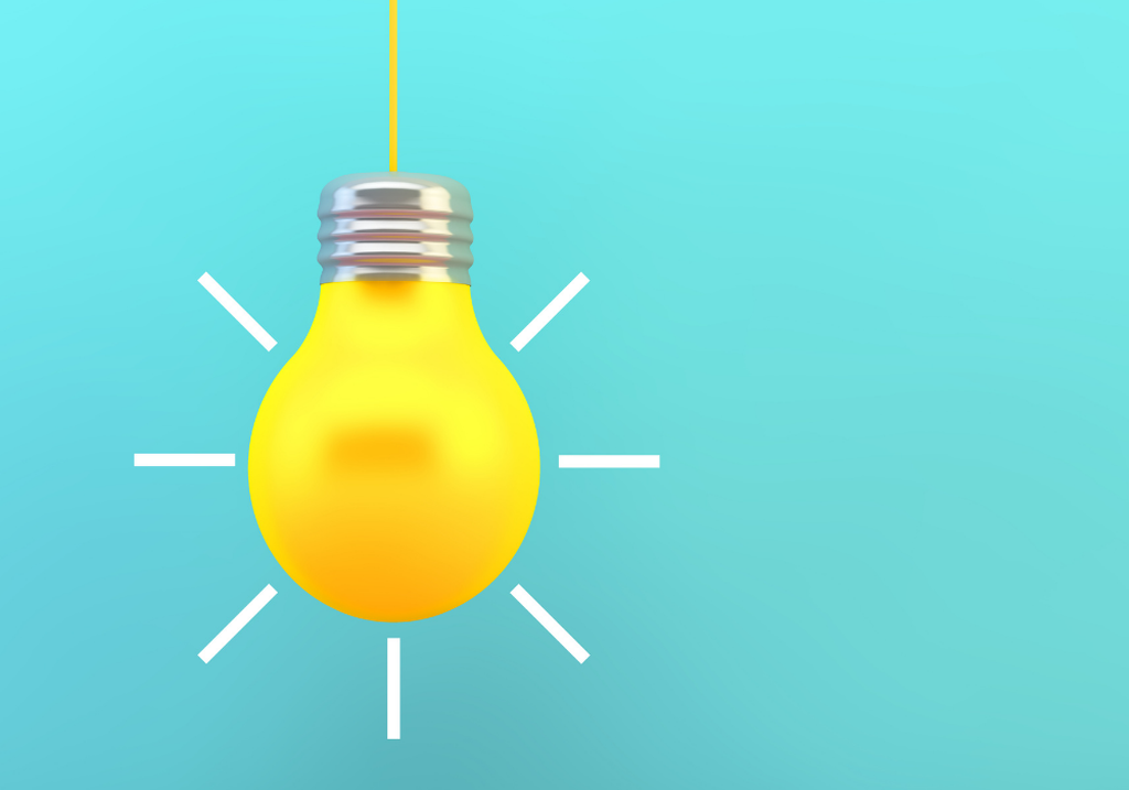 Yellow lightbulb on a blue background