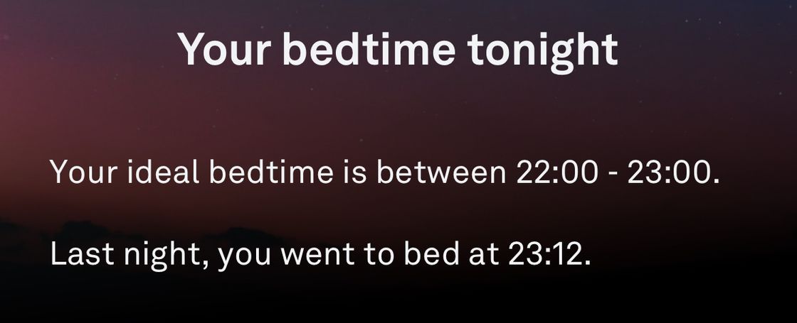 A screenshot from the Oura app that says the following: Your bedtime tonight. Your ideal bedtime is between 22:00 - 23:00. Last night, you went to bed at 23:12.