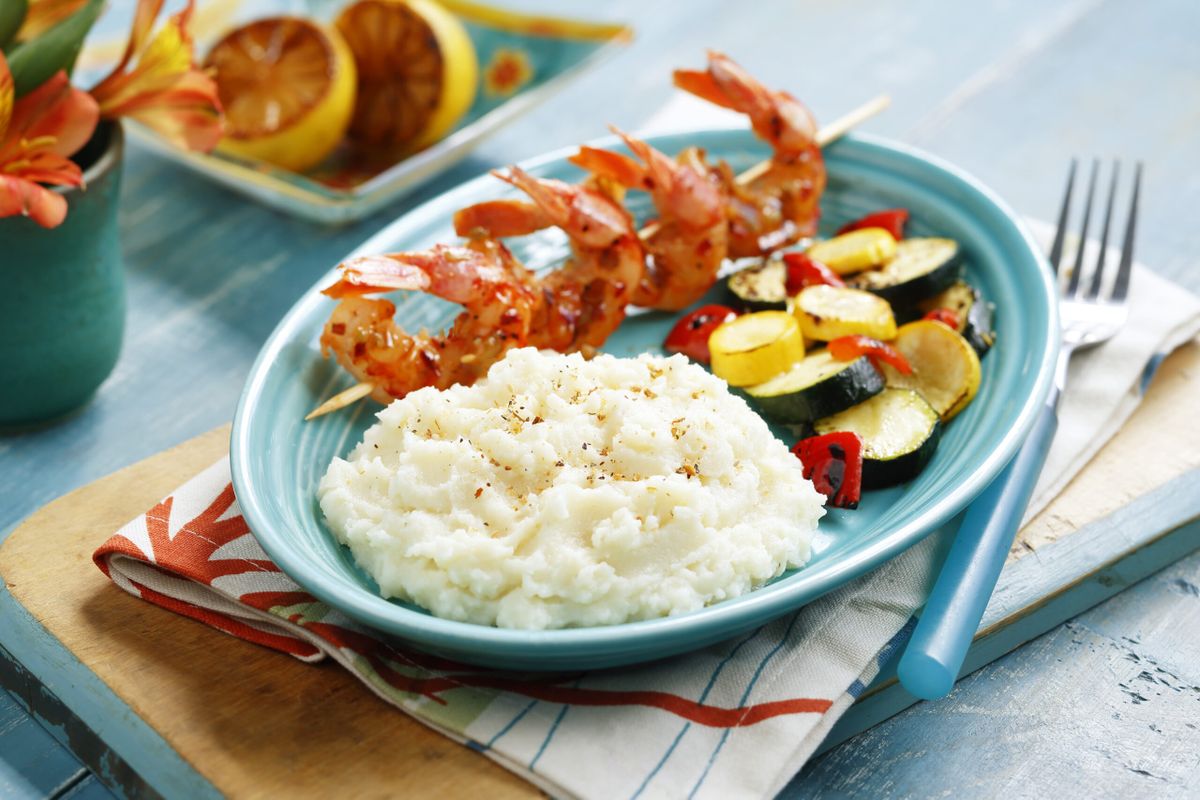 Idahoan® Chicken Broth Mashed Potatoes with Grilled Garlic Butter Shrimp and Roasted Zucchini and Peppers – Featured Image