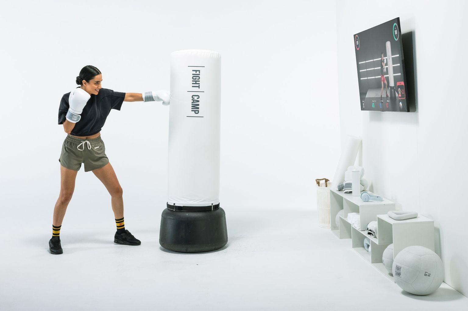 Woman boxing with FightCamp