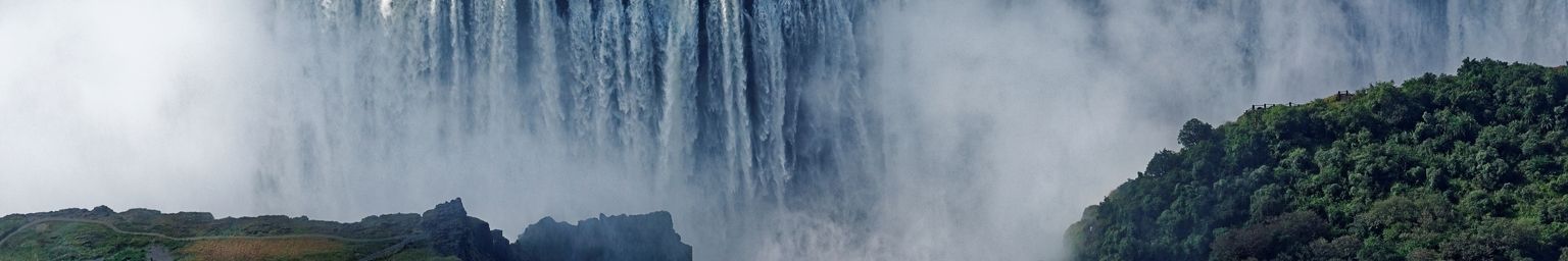 An aerial view of Victoria Falls with spray 