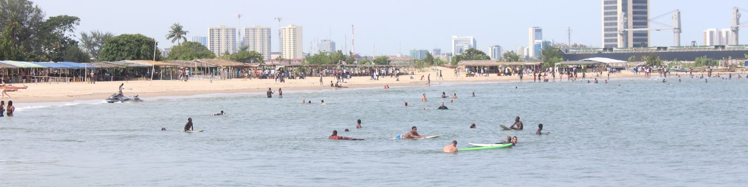 People swimming at Takes Bay beach , Lagos, Nigeria