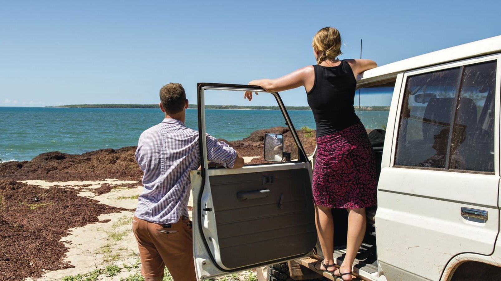 A couple enjoying the view at from their 4WD at Macassan Beach in Arnhem Land NT