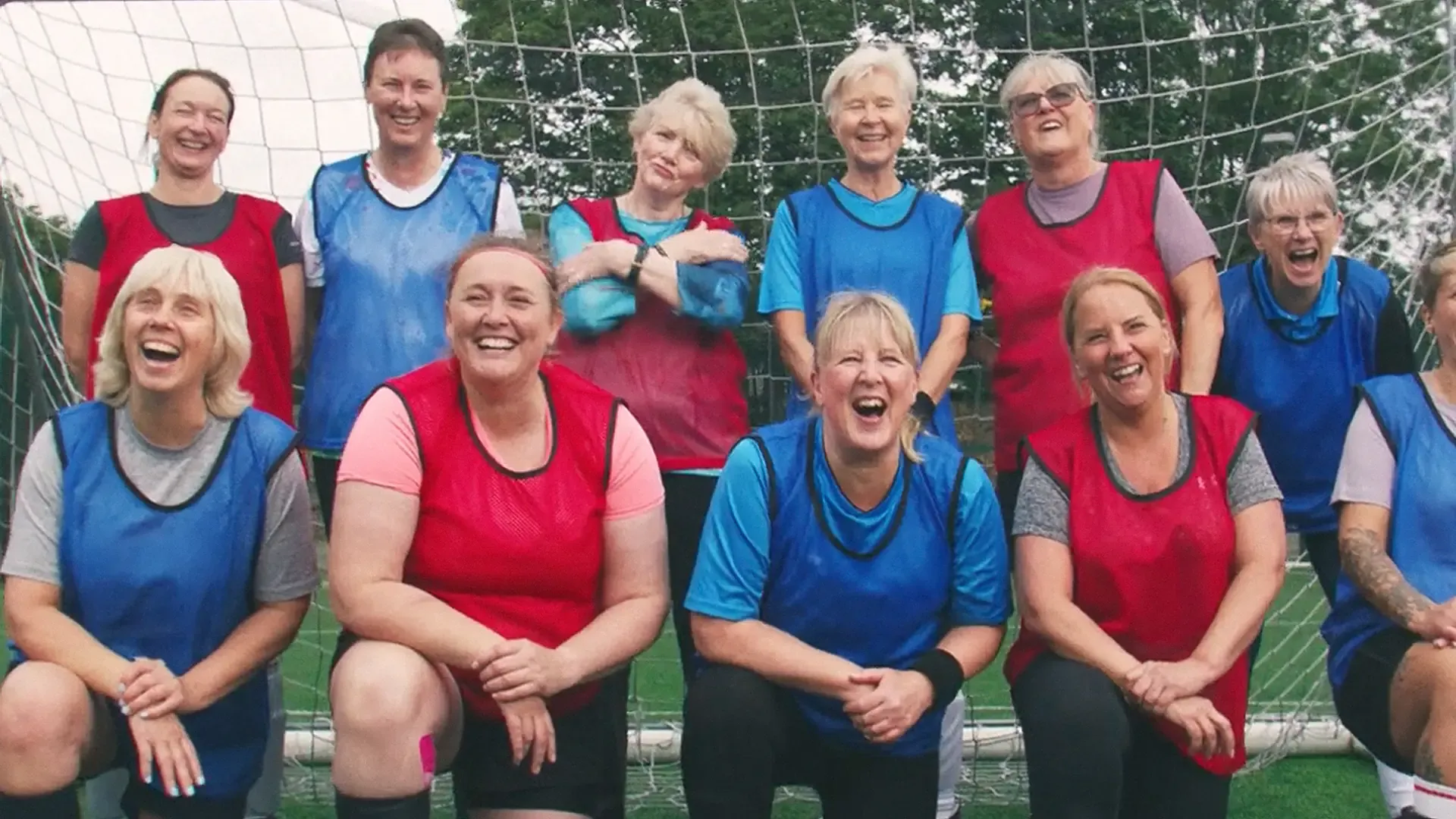 Women's football team posing under the goal posts in the This Girl Can campaign film