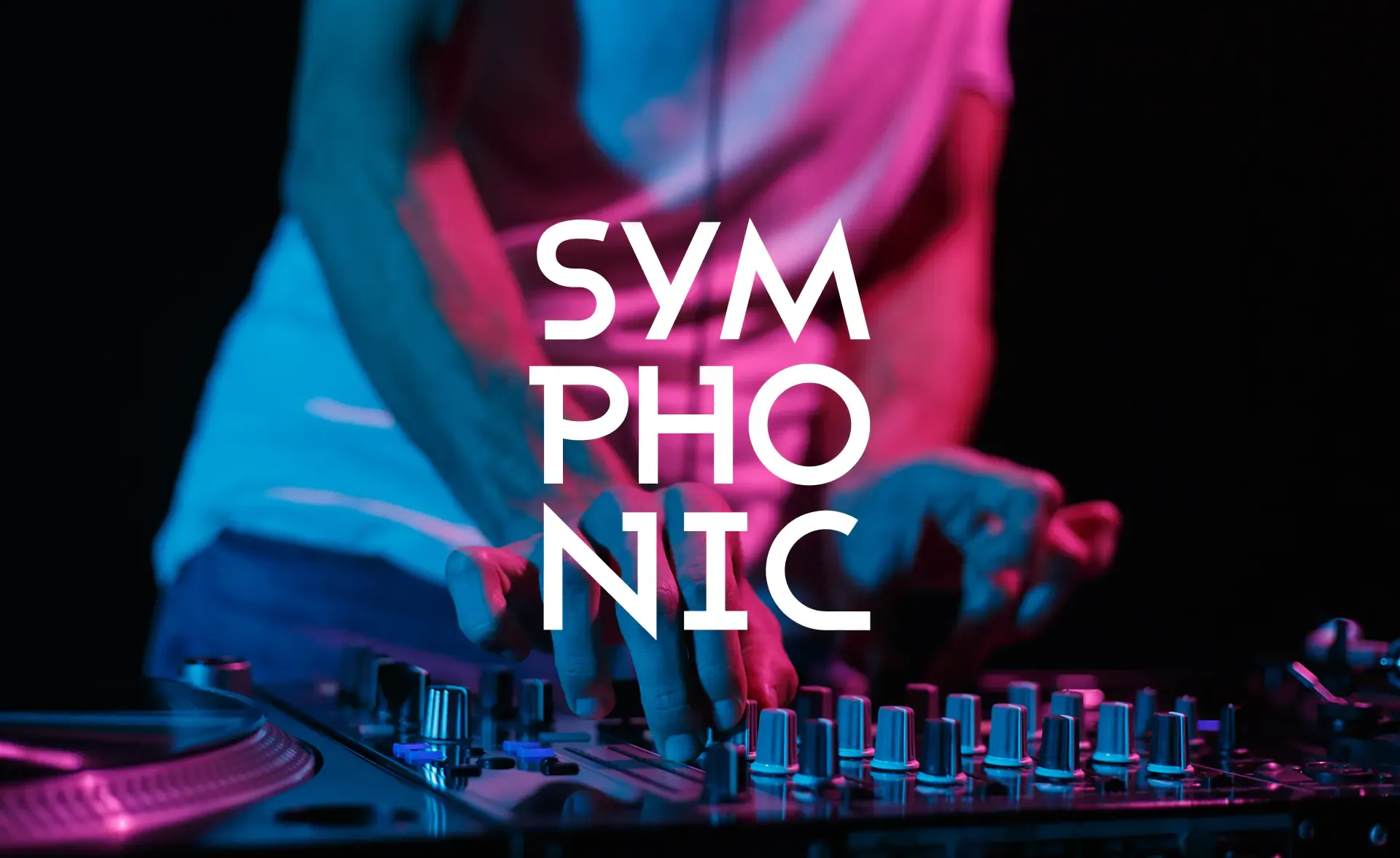 DJ mixing on the decks under pink and blue neon with the Symphonic wordmark