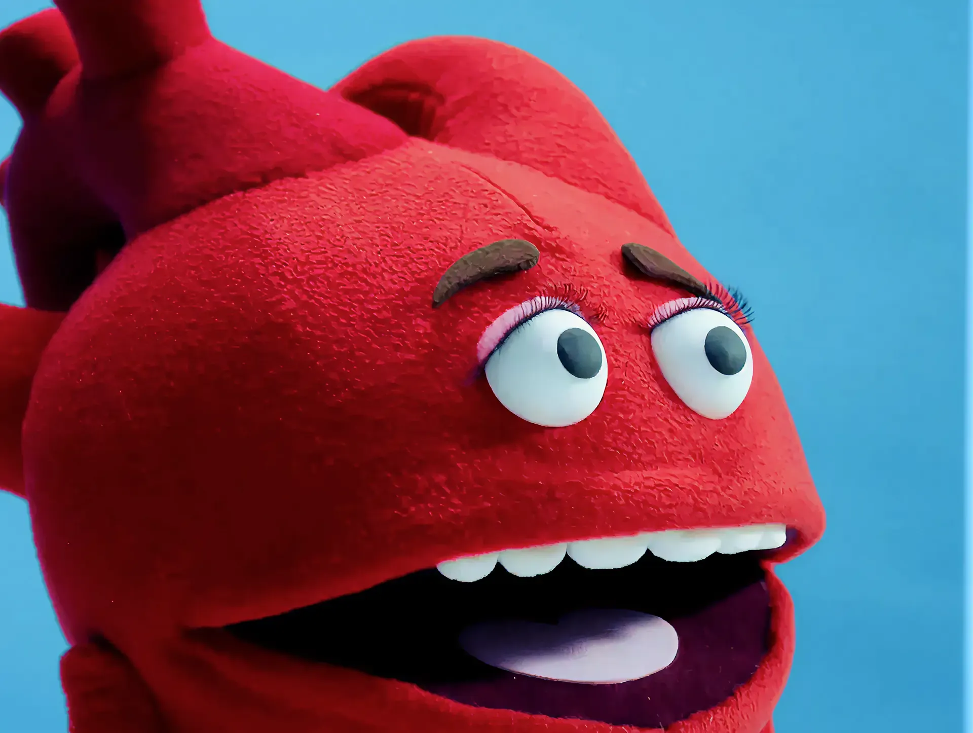 Close-up of the red heart puppet character on blue, from the Dutch Ministry of Health anti-vaping campaign