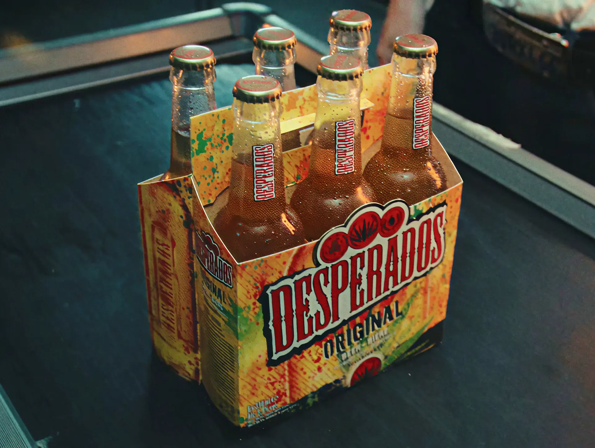 Six-pack of Desperados beer bottles, from the MassiveMusic Desperados campaign