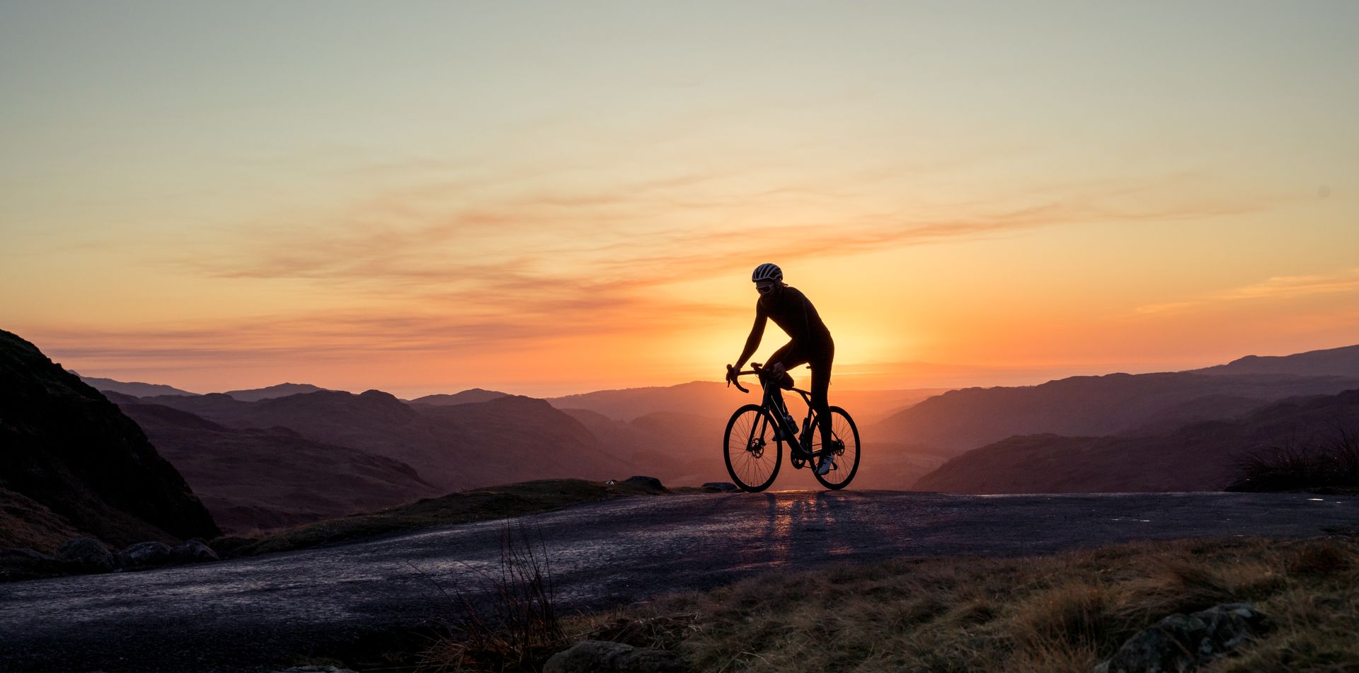 Kevin Merrey riding the Pulsium 3.0 disc bike under the sunset