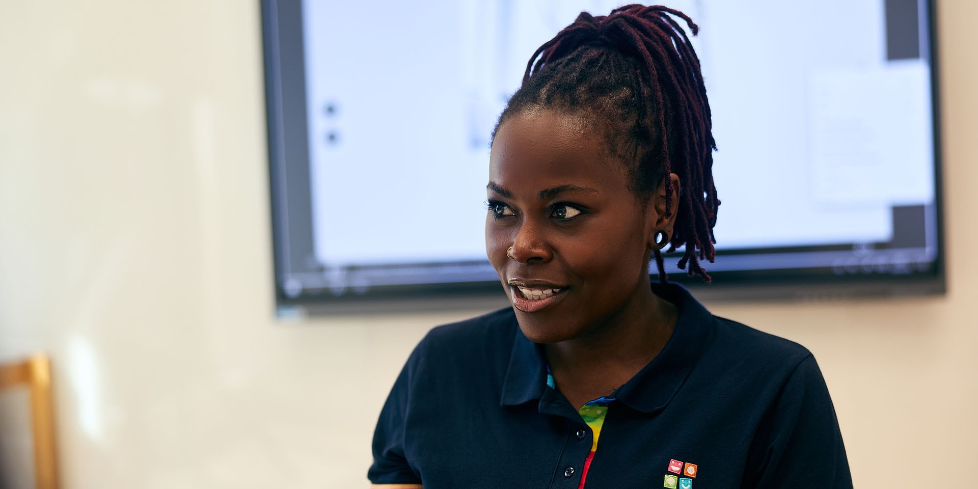 a person looking afar and smiling