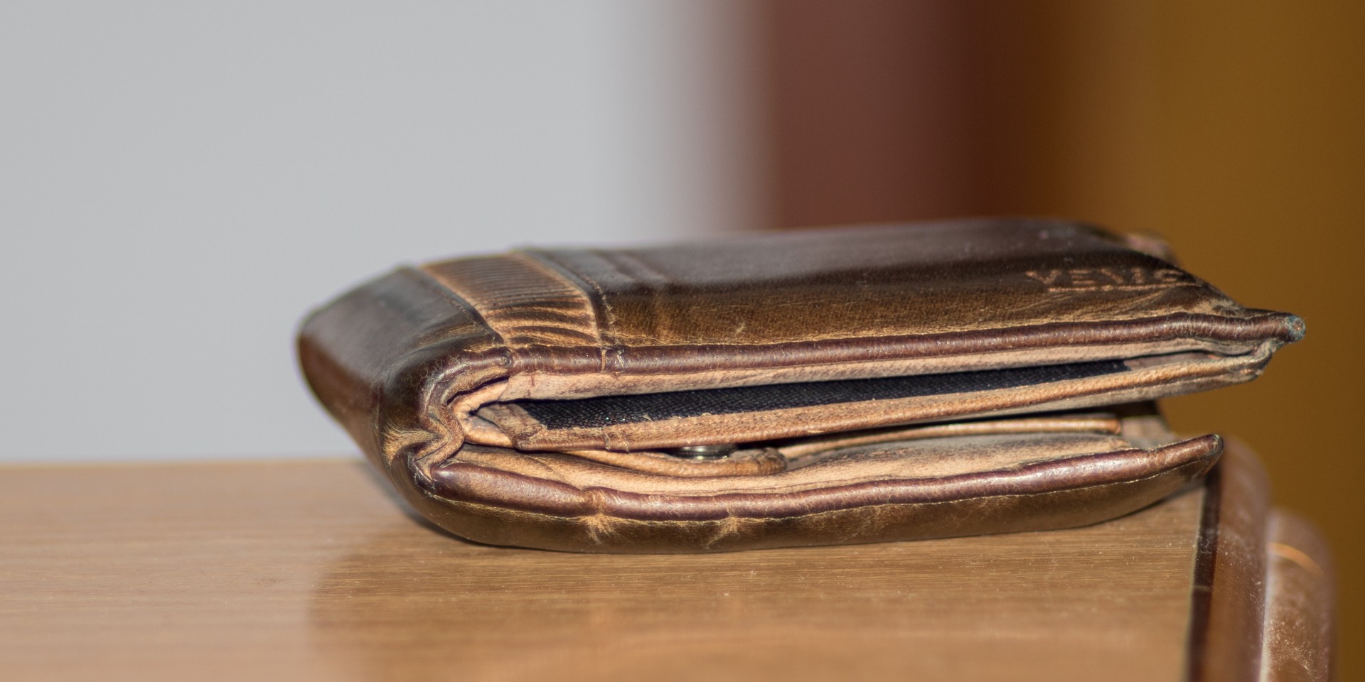 a brown leather wallet