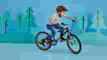 A child riding a Raleigh POP bike