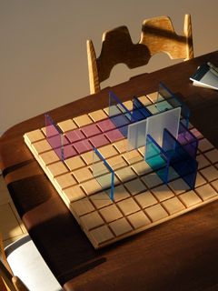 chess board with a perplex glass pieces