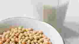 Bowl of soya beans and a glass of soya milk