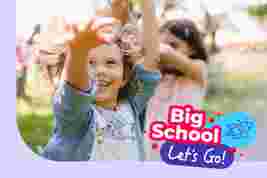 A cheerful girl with curly hair reaches for bubbles in a sunny outdoor setting, with "Big School Let's Go!" text overlay.