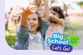 A smiling child with curly hair reaches for bubbles outdoors, with "Big School, Let's Go!" text in the corner.