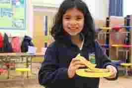 Term Time Club Child Eating Breakfast Toast