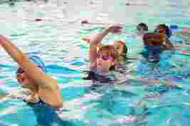 Children doing a group activity in the swimming pool