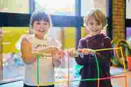 Children building with straws
