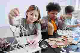 kids crafting atomic sculptures
