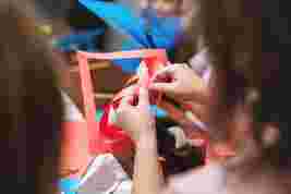 kids playing with origami