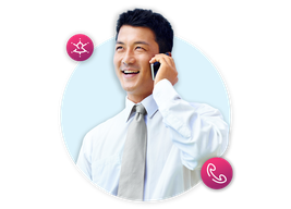 Man smiles whilst on the phone with customer service agents
