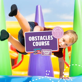 Child playing on a colorful inflatable obstacle course with a sign for a special event at a summer camp.