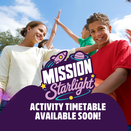 Children smiling and high-fiving outdoors under a blue sky, with a "Mission Starlight" banner and announcement of activity timetable availability.