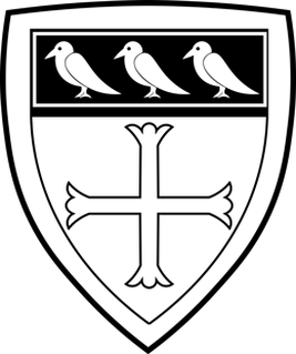 A black and white shield with three birds on a black band above a cross in the center.