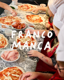 Children in chef hats making pizzas with toppings at a table, with "Franco Manca" written across the image.