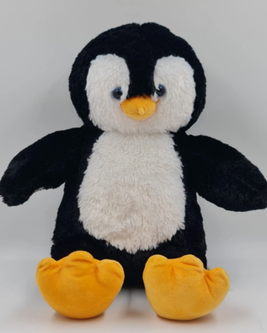 A plush penguin toy with a white belly, black body, yellow beak, and feet, sitting against a plain white background.