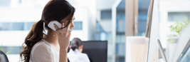 An agent takes a call about the benefits of cloud contact centers