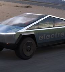 Auto znacky Tesla jedouci na ceste
