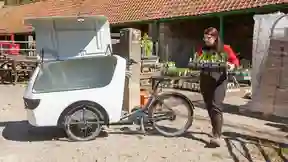 A National Trust employee loading a Ebikespecialist eCargo bike
