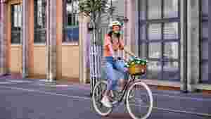 Lady riding a Raleigh Willow classic bike