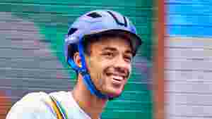 Man wearing a Raleigh Glyde bicycle helmet