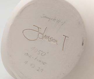 hand signing of bottom of ceramic